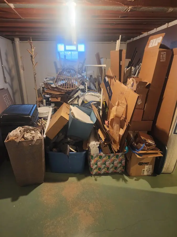 Roll-off dumpster container at job site for 15 Yard Dumpster Rental in Peculiar